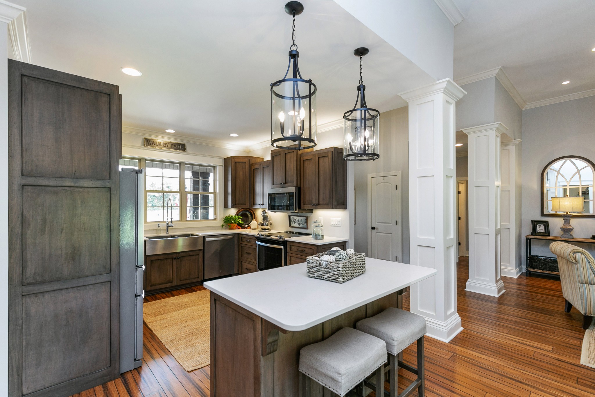 676 Burford Road Lebanon, TN 37087 - Photo 10 of 33 a kitchen with sink refrigerator dining table and chairs