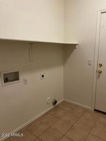 a house view with a backyard space