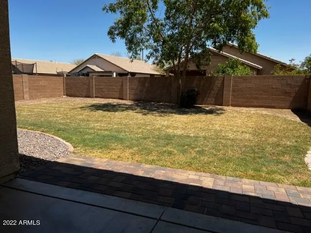 a backyard view with a lake view