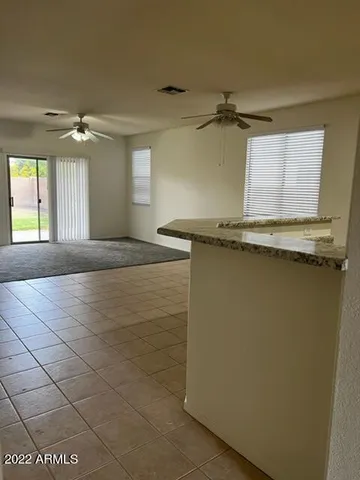 a view of a kitchen with a sink and dishwasher