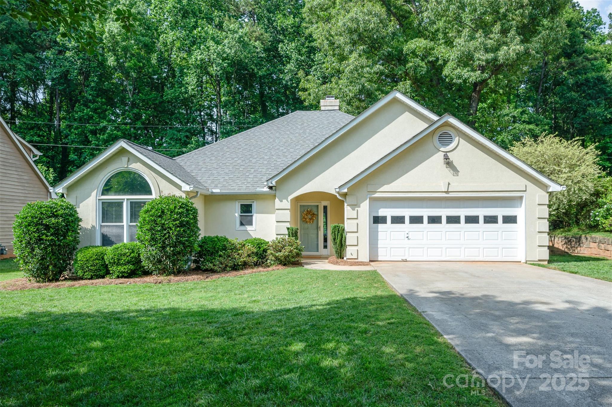 105 Banksridge Road Fort Mill, SC 29715 - Photo 1 of 30 a view of front house and garden