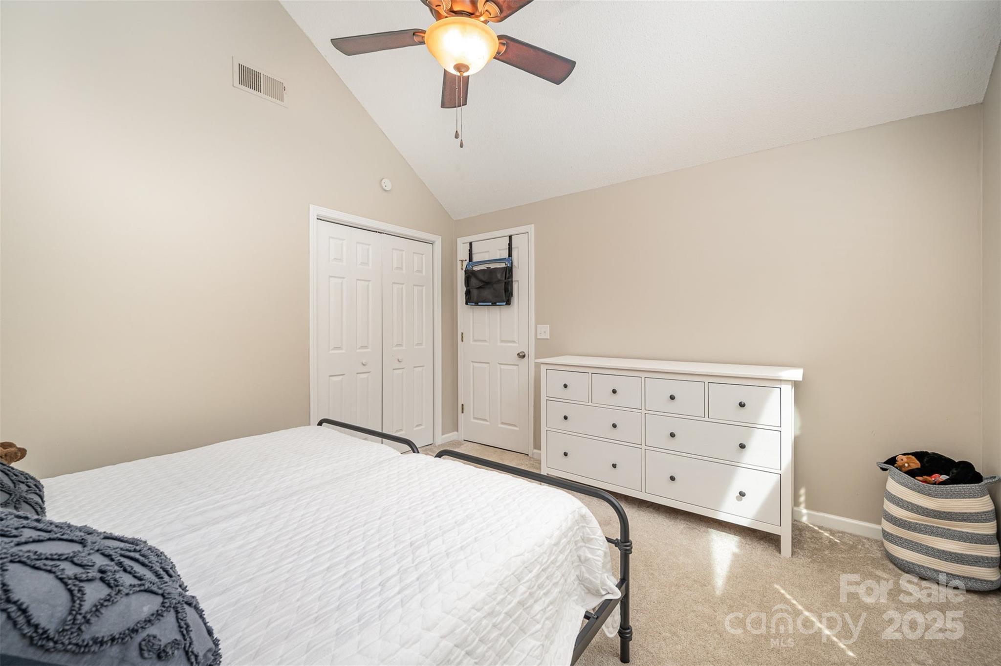 105 Banksridge Road Fort Mill, SC 29715 - Photo 15 of 30 a bedroom with a bed and a dresser