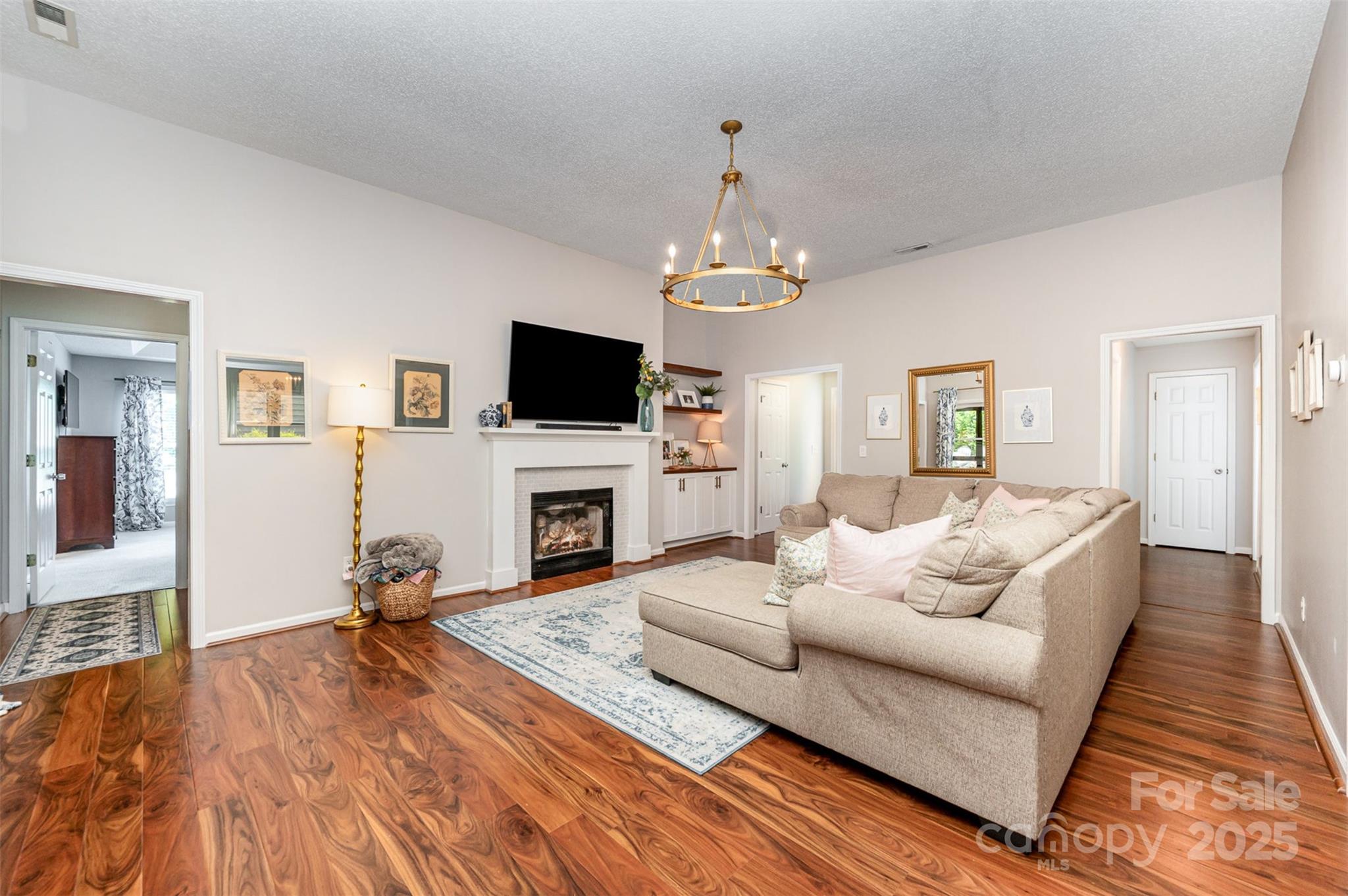 105 Banksridge Road Fort Mill, SC 29715 - Photo 2 of 30 a living room with furniture and a fireplace