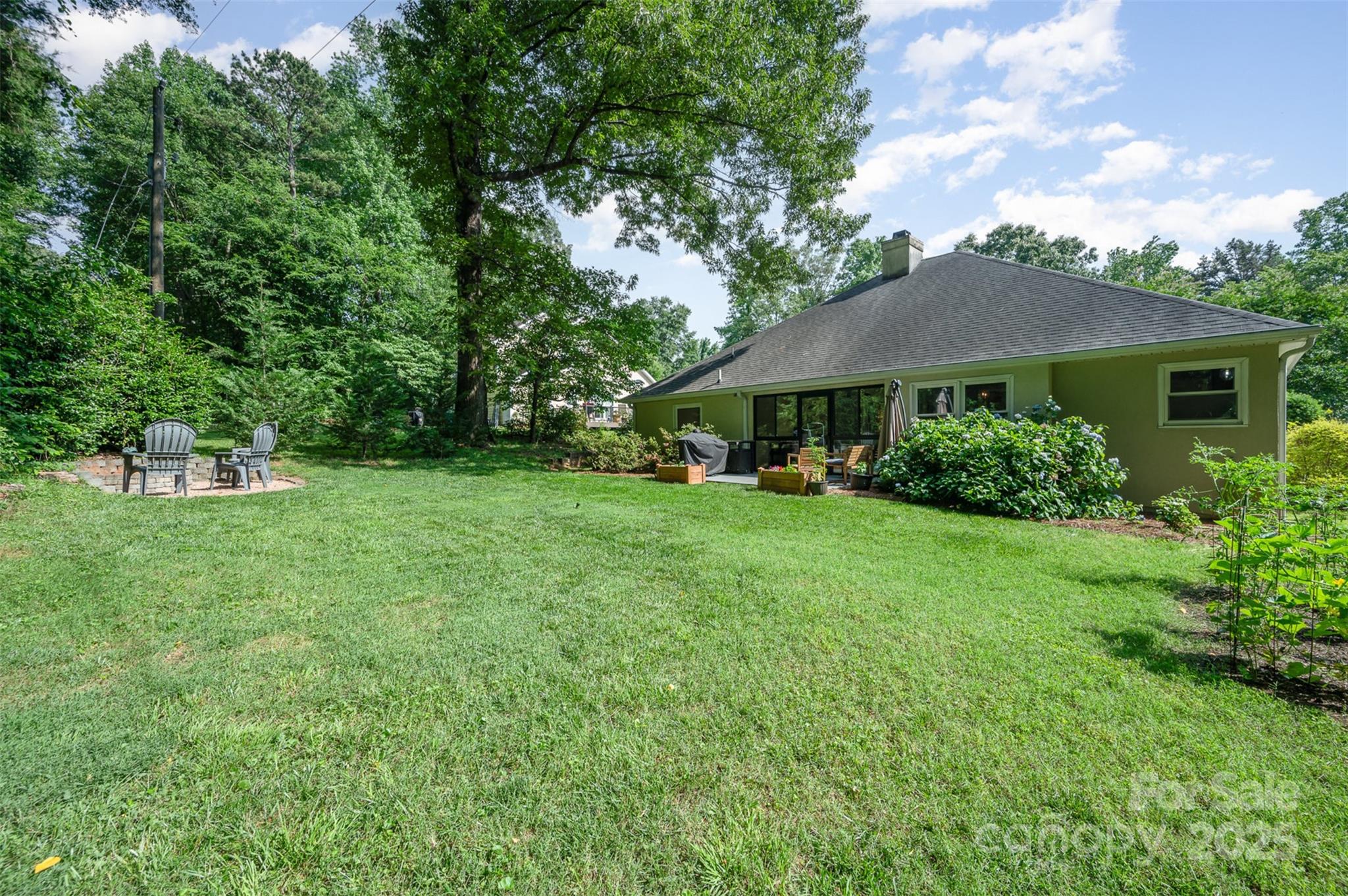 105 Banksridge Road Fort Mill, SC 29715 - Photo 22 of 30 a view of house in front of a big yard with large trees