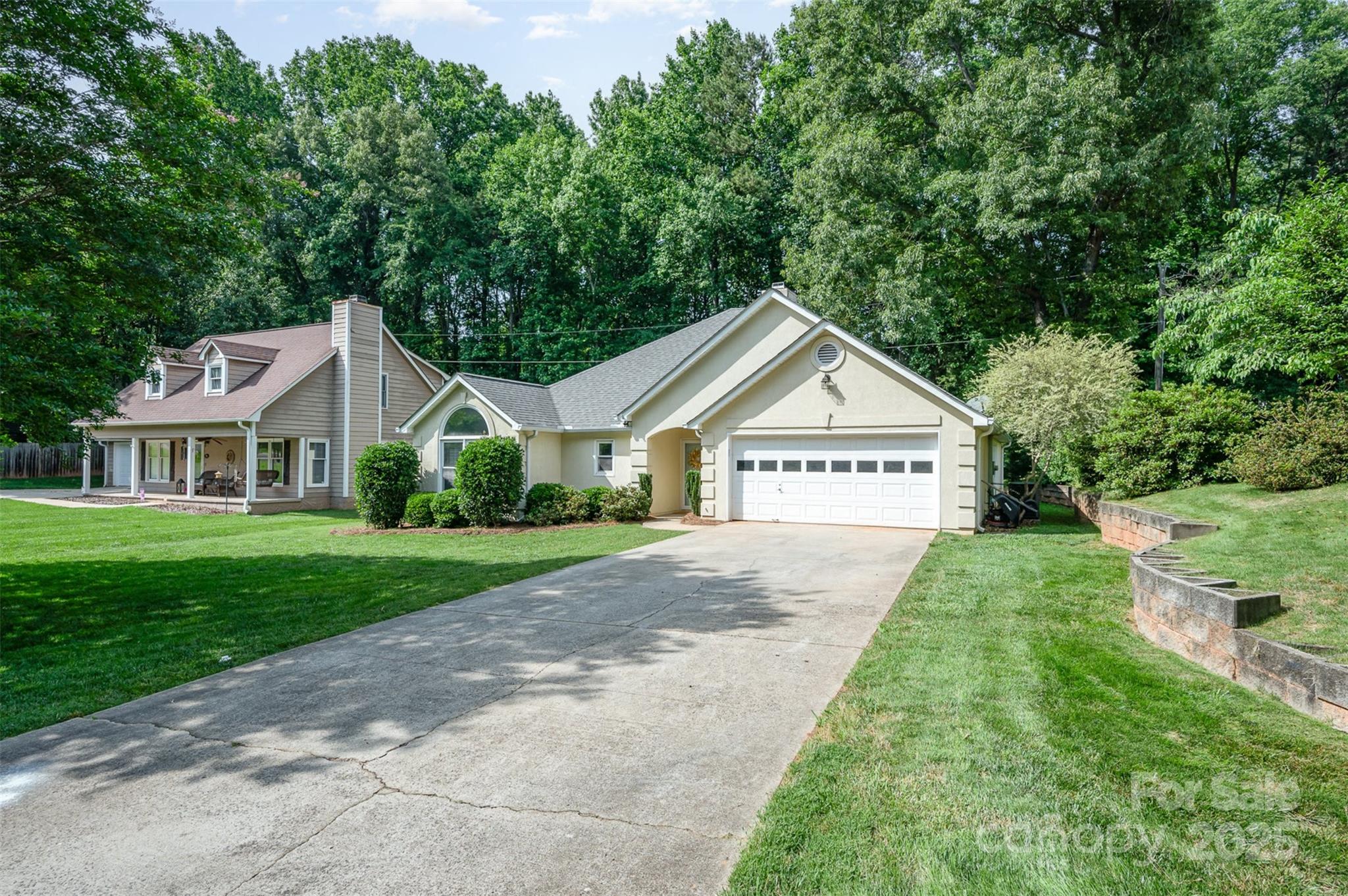 105 Banksridge Road Fort Mill, SC 29715 - Photo 25 of 30 a view of a house with a yard and large trees