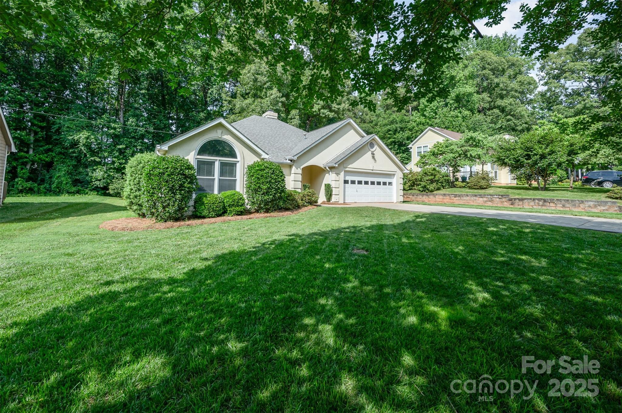 105 Banksridge Road Fort Mill, SC 29715 - Photo 26 of 30 a front view of a house with yard and green space