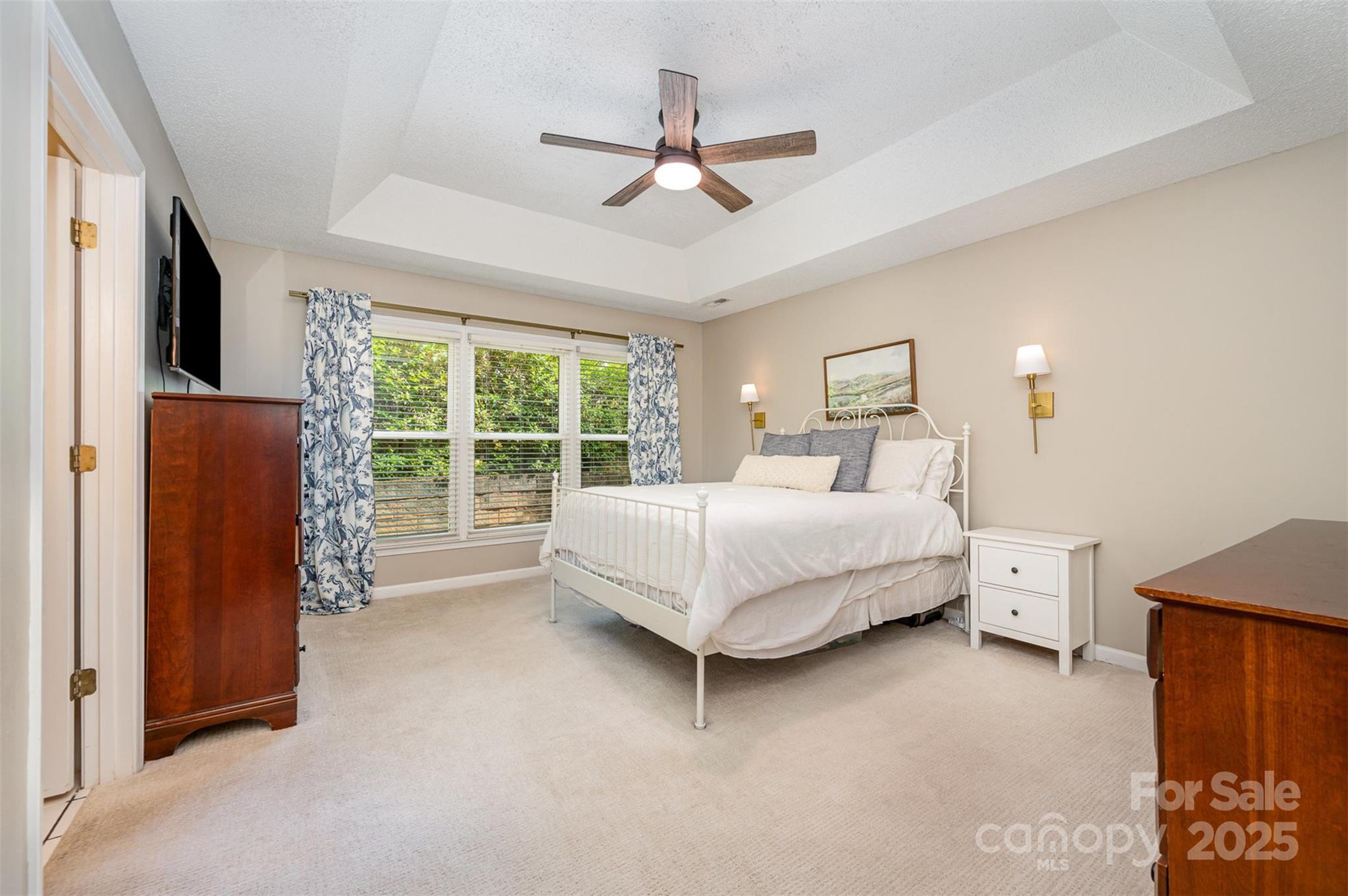 105 Banksridge Road Fort Mill, SC 29715 - Photo 10 of 30 a spacious bedroom with a bed and a large window