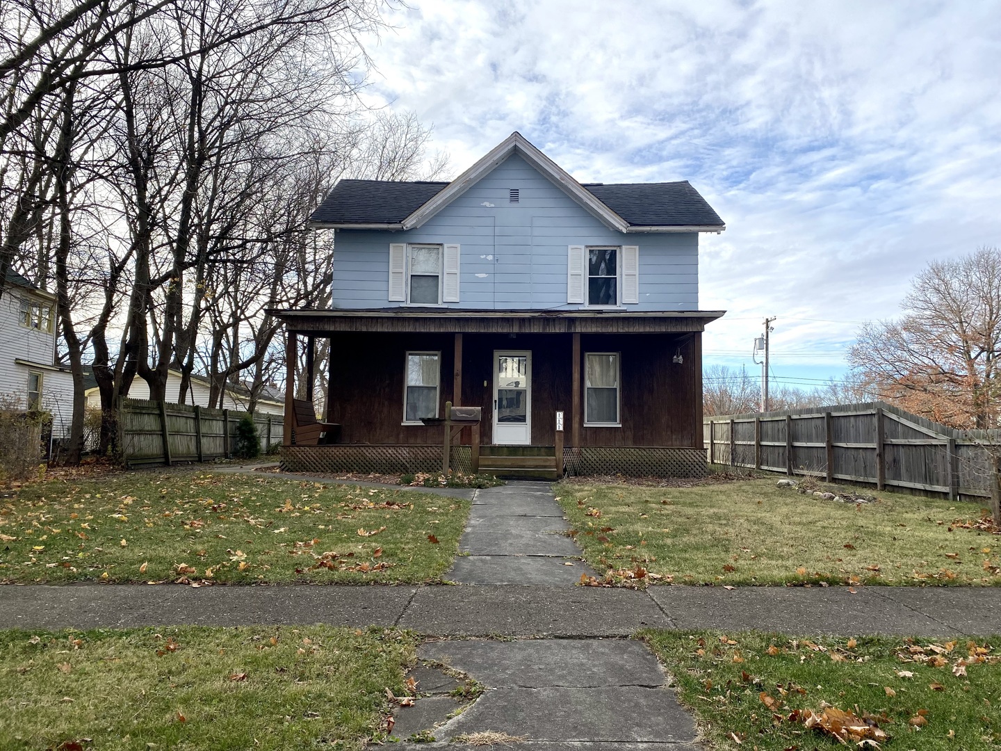 111 East Elm Street Fairbury, IL 61739 - Photo 1 of 11 a front view of a house with garden