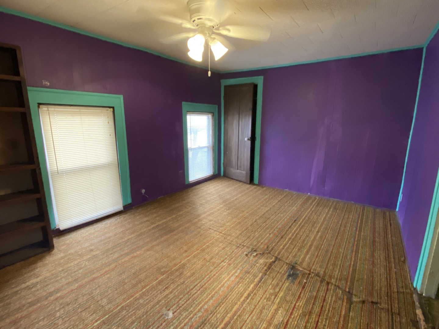 111 East Elm Street Fairbury, IL 61739 - Photo 10 of 11 a view of empty room with window and wooden floor