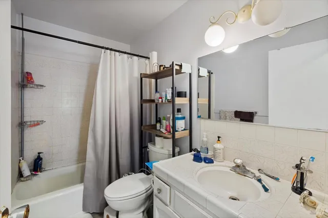 a kitchen with a dining table and chairs
