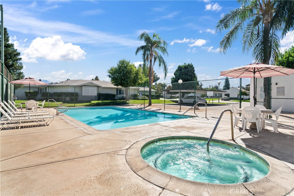 1068 Occidental Circle Redlands, CA 92374 - Photo 24 of 26 a view of a swimming pool with a patio