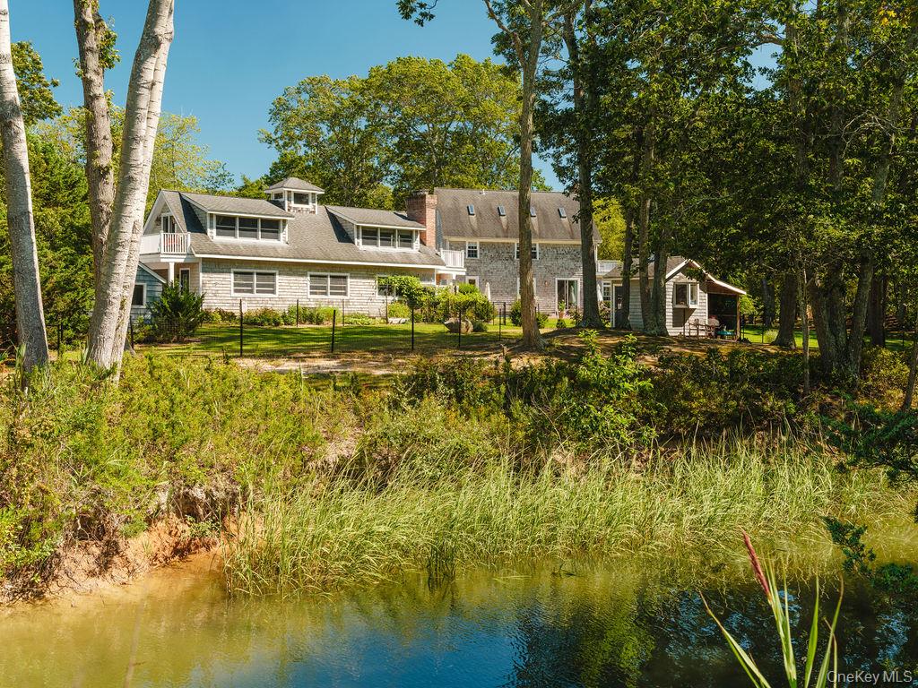 10947 North Bayview Road Southold, NY 11971 - Photo 16 of 43 Back of property featuring a water view