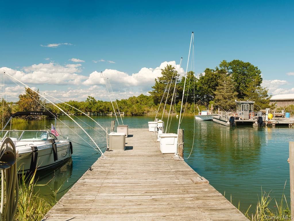 10947 North Bayview Road Southold, NY 11971 - Photo 17 of 43 Dock featuring a water view