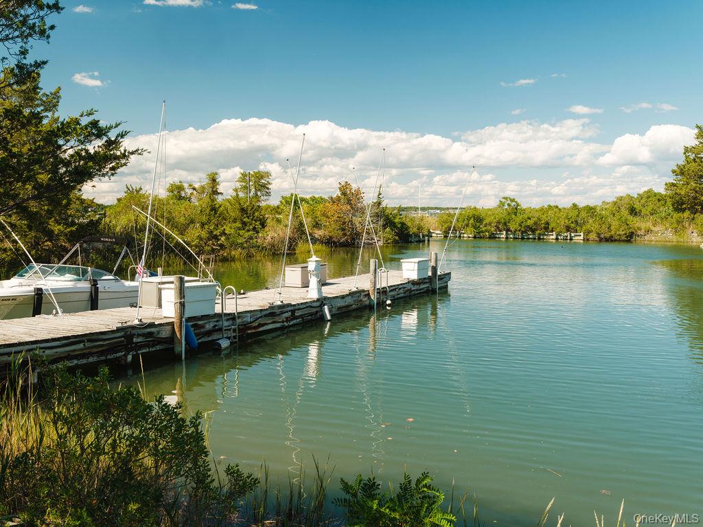 10947 North Bayview Road Southold, NY 11971 - Photo 18 of 43 Dock featuring a water view