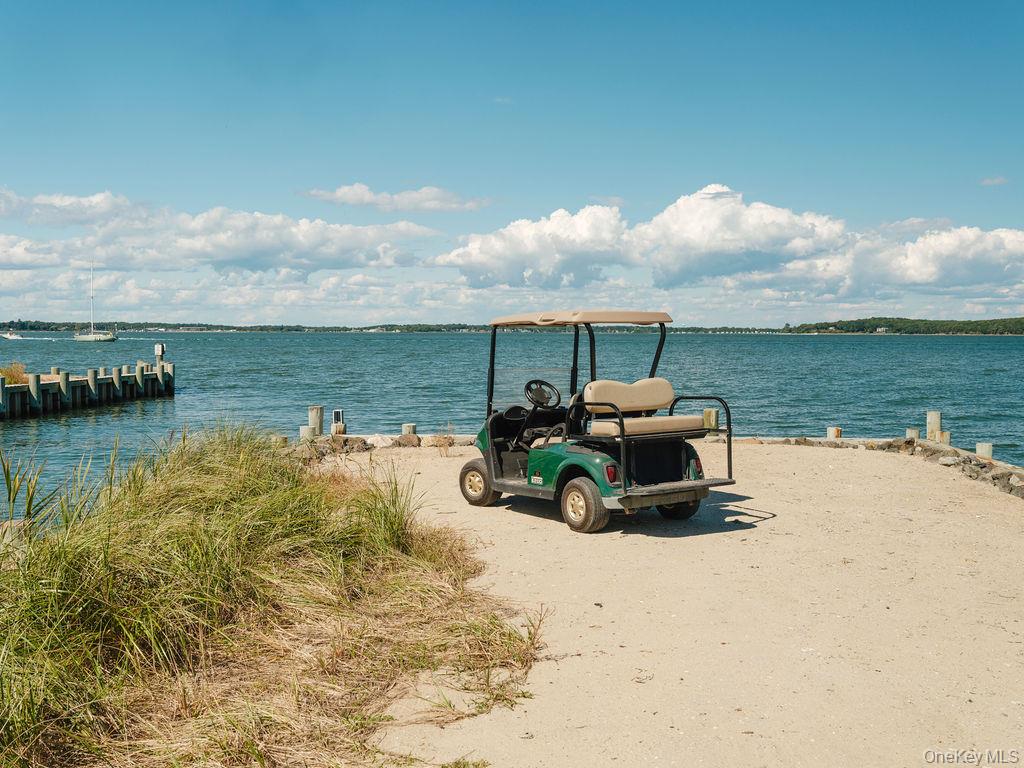 10947 North Bayview Road Southold, NY 11971 - Photo 20 of 43 Water view featuring a boat ramp and a dock