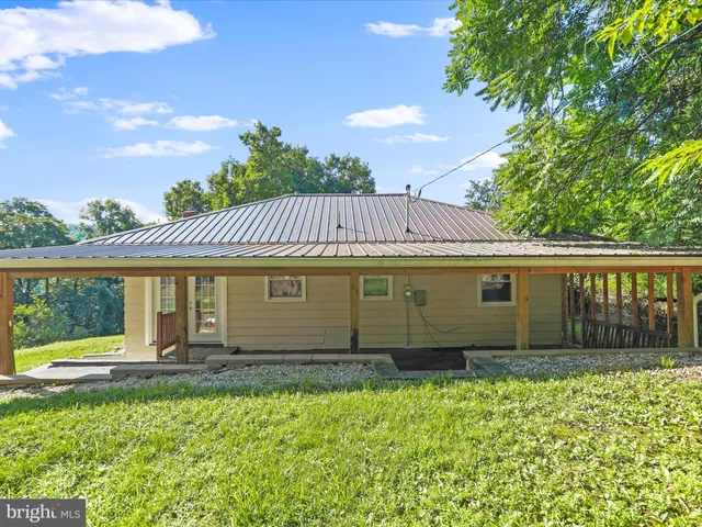 front view of a house with a garden