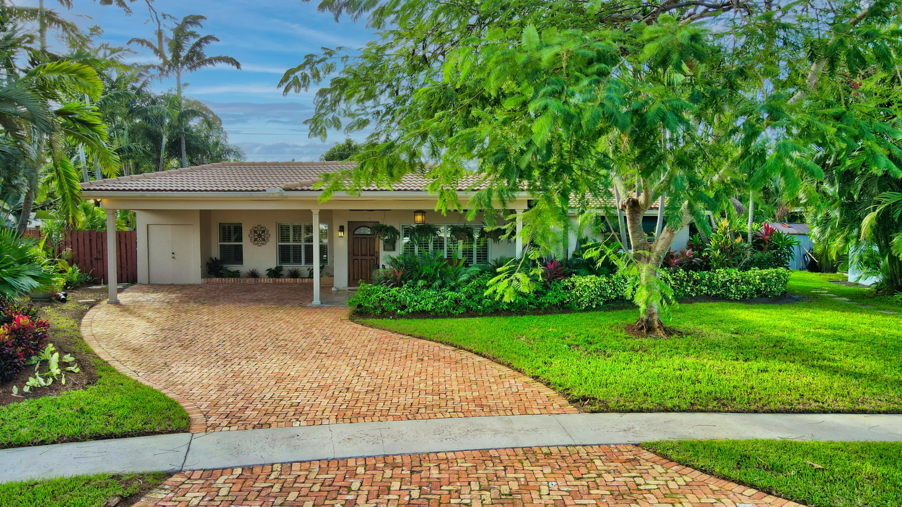 699 Southwest 8th Terrace Boca Raton, FL 33486 - Photo 1 of 40 Front Exterior