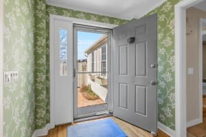 1114 Orleans Road, Unit 2 Chatham, MA 02650 - Photo 2 of 38 a view of a bathroom that has a glass door and shower