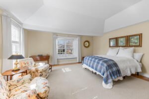 1114 Orleans Road, Unit 2 Chatham, MA 02650 - Photo 23 of 38 a spacious bedroom with a bed and window