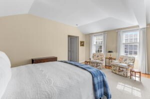 1114 Orleans Road, Unit 2 Chatham, MA 02650 - Photo 24 of 38 a bedroom with a bed and a couch