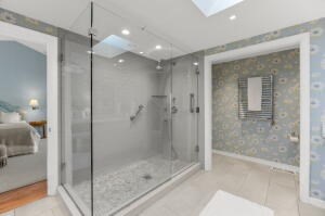 1114 Orleans Road, Unit 2 Chatham, MA 02650 - Photo 33 of 38 a bathroom with a shower and a glass door
