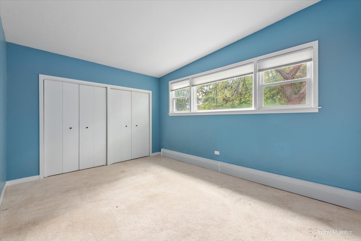 239 Beverly Road Barrington, IL 60010 - Photo 13 of 28 a view of an empty room with a window