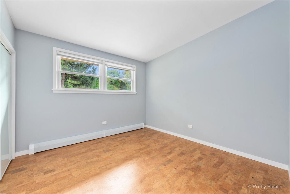 239 Beverly Road Barrington, IL 60010 - Photo 19 of 28 an empty room with a window