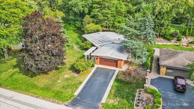 a backyard of a house with lots of green space