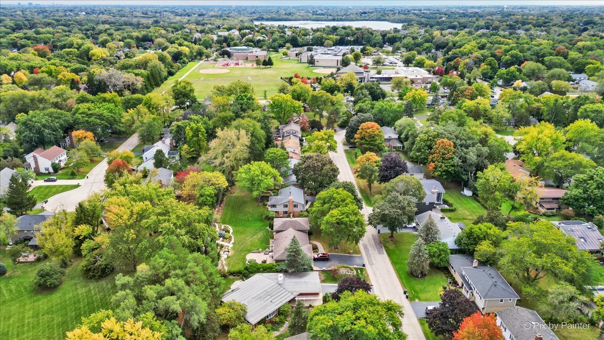 239 Beverly Road Barrington, IL 60010 - Photo 24 of 28 an aerial view of residential houses with outdoor space and trees