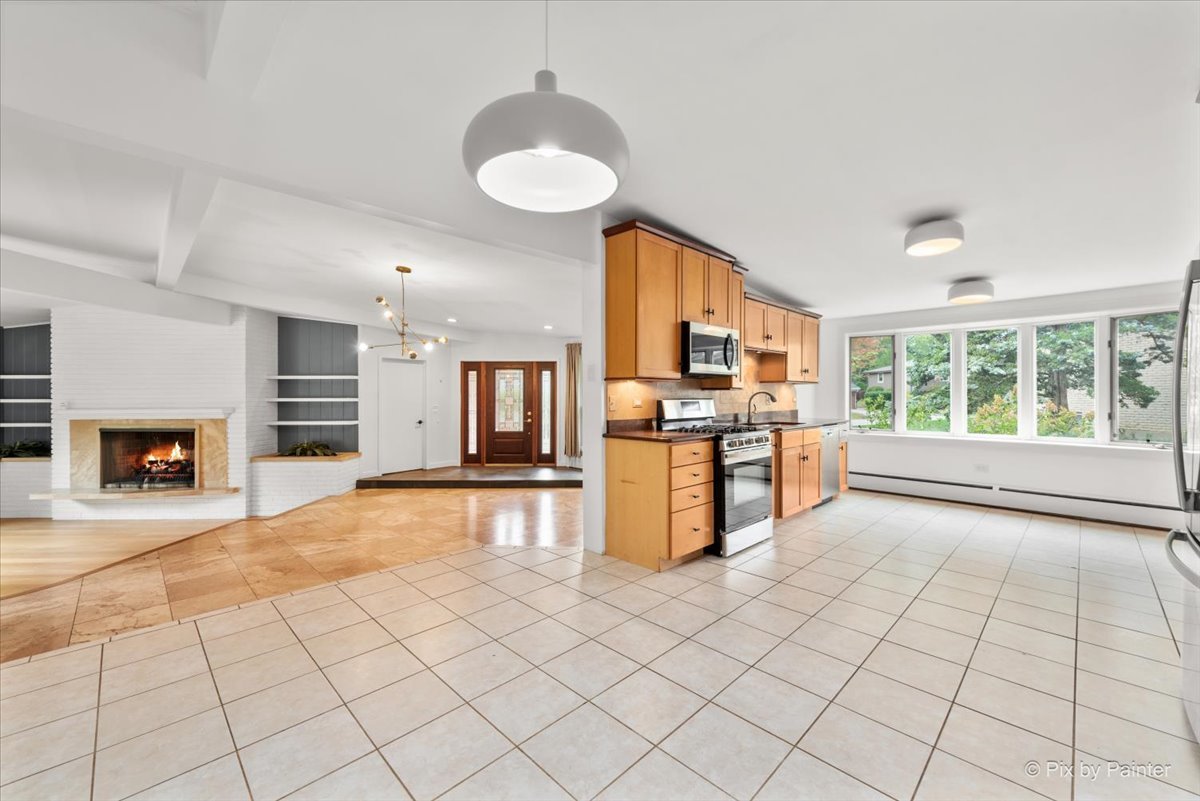 239 Beverly Road Barrington, IL 60010 - Photo 10 of 28 a view of kitchen with furniture and fireplace