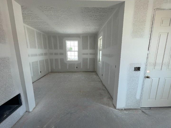 5765 Haystack Drive St. Cloud, FL 34771 - Photo 15 of 42 an empty room with a empty space and window