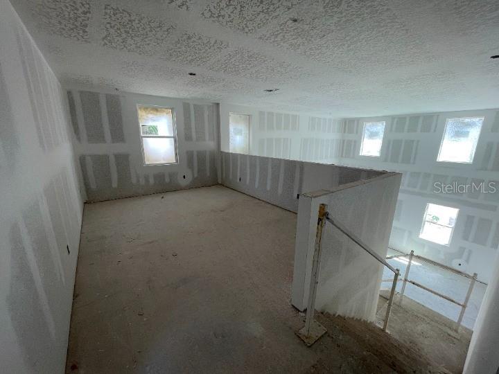 5765 Haystack Drive St. Cloud, FL 34771 - Photo 20 of 42 a view of an empty room with a window
