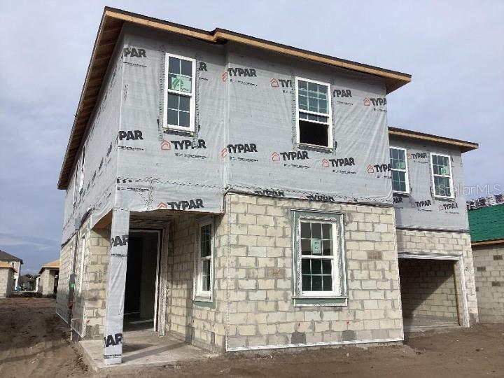 5765 Haystack Drive St. Cloud, FL 34771 - Photo 2 of 42 a front view of a house