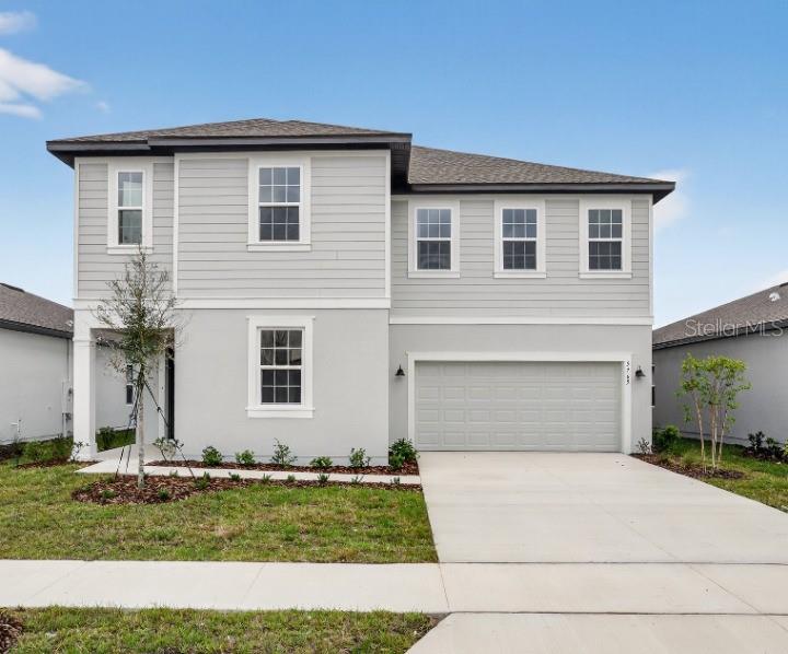 5765 Haystack Drive St. Cloud, FL 34771 - Photo 2 of 42 a front view of house with yard