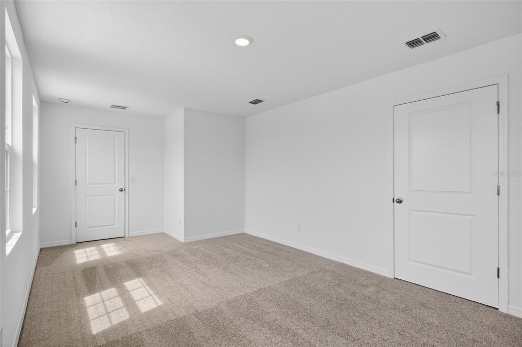 5765 Haystack Drive St. Cloud, FL 34771 - Photo 26 of 42 a view of an empty room