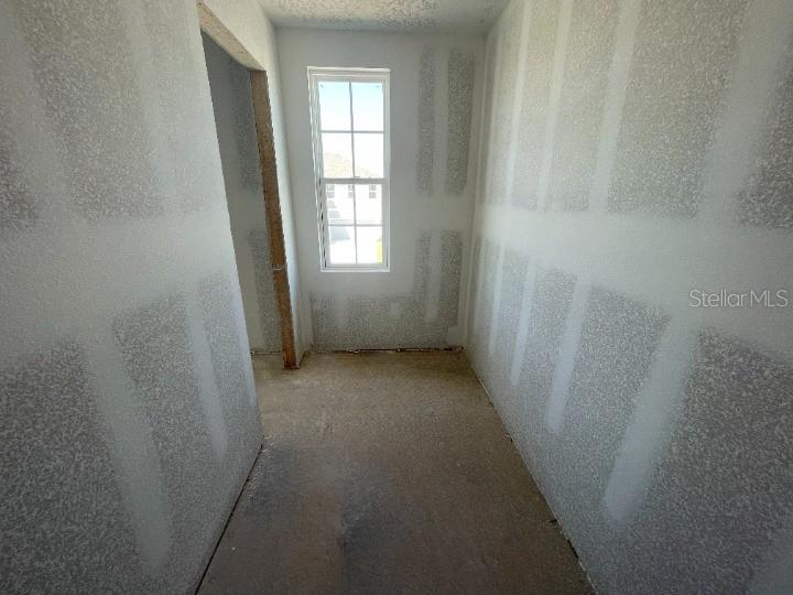 5765 Haystack Drive St. Cloud, FL 34771 - Photo 34 of 42 en empty room with windows