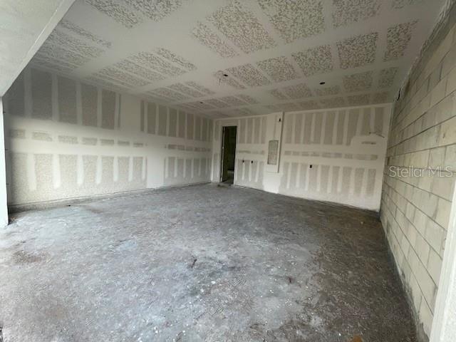 5765 Haystack Drive St. Cloud, FL 34771 - Photo 38 of 42 a view of an empty room with a window