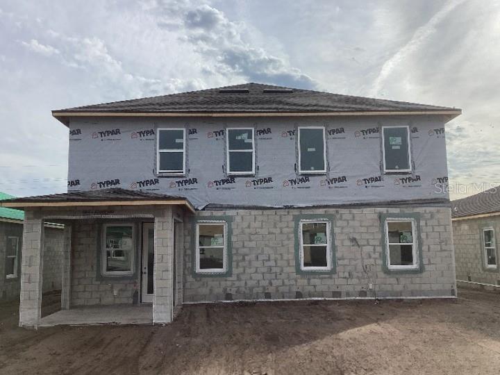 5765 Haystack Drive St. Cloud, FL 34771 - Photo 40 of 42 a front view of a house