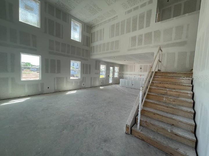 5765 Haystack Drive St. Cloud, FL 34771 - Photo 10 of 42 a view of entryway and hall with wooden floor