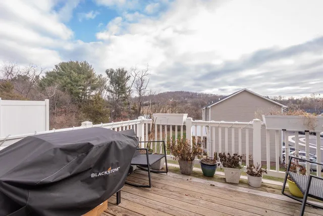 a view of a chairs and table on the terrace