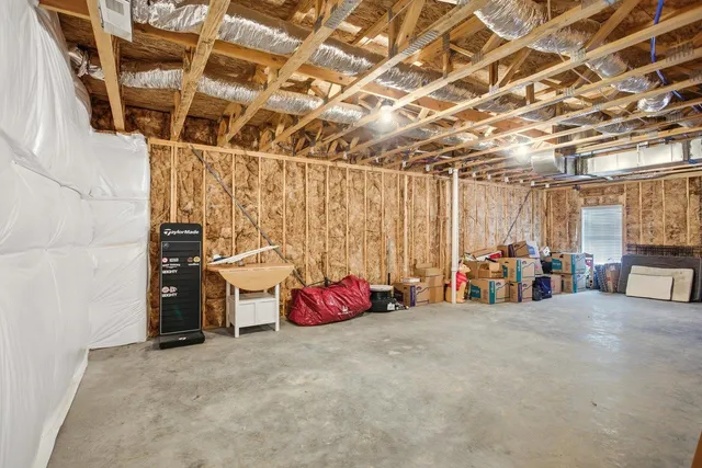 a view of a room with wooden walls