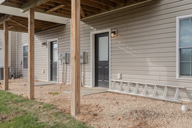 a front view of a building with street view