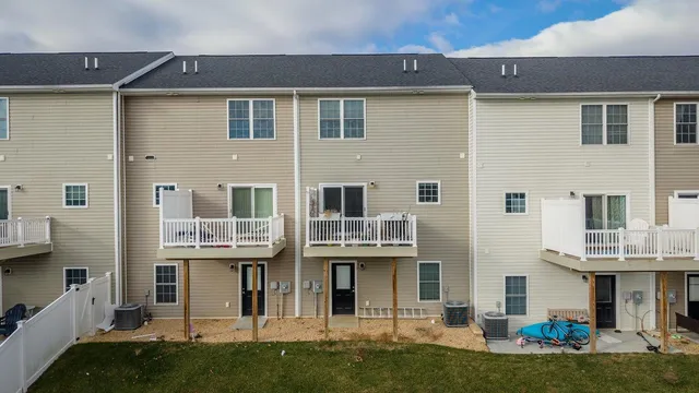 a front view of a building with street view