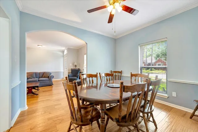 a view of a dining room with furniture