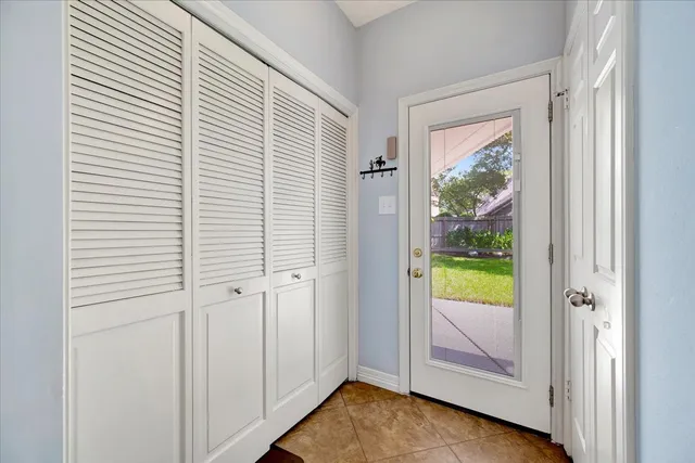 a view of a room that has a window in it