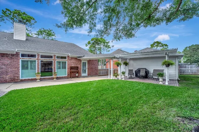 front view of a house with a garden