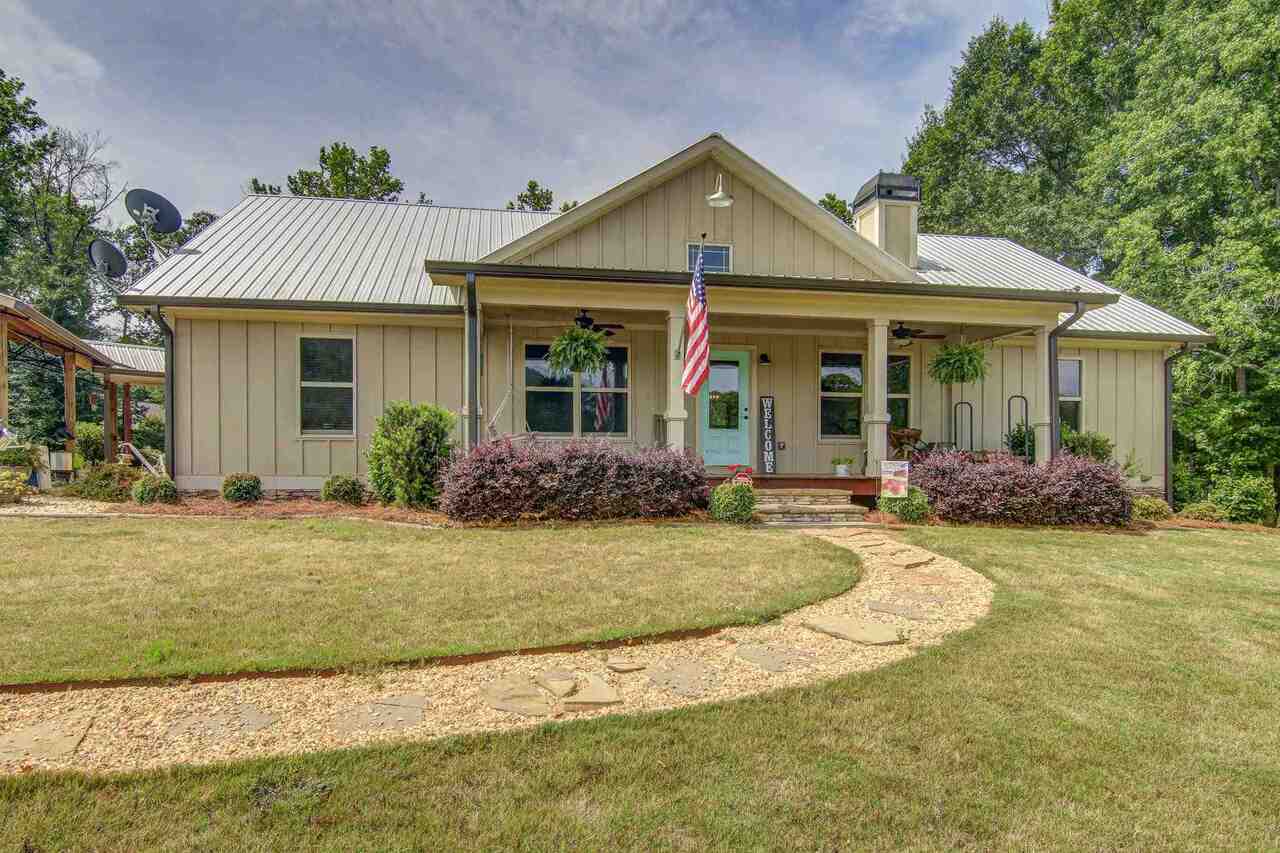 1410 Walker Road Madison, GA 30650 - Photo 1 of 1 front view of a house with a yard