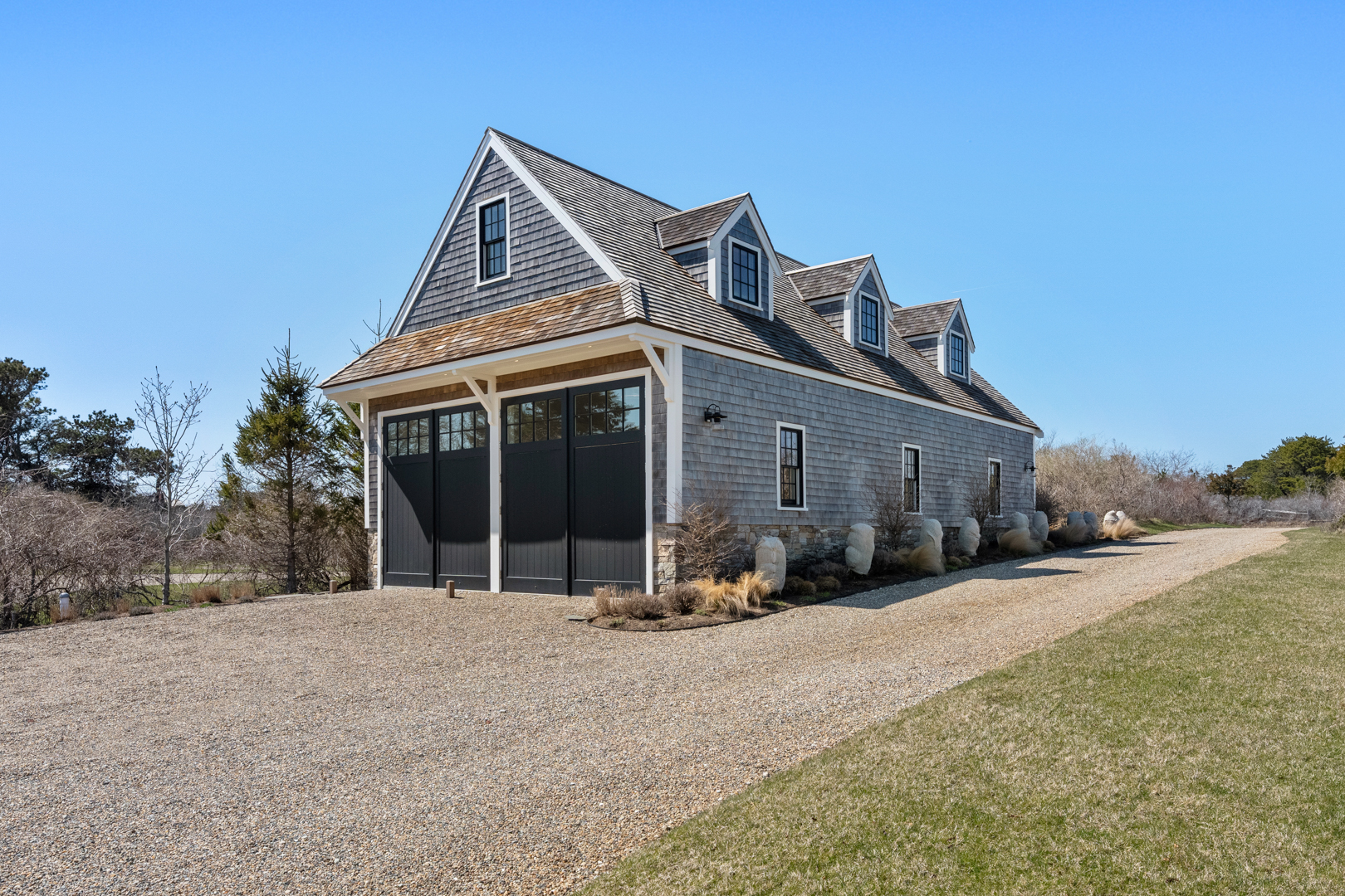 174 Cliff Road Nantucket, MA 02554 - Photo 43 of 49 a view of a house with a yard