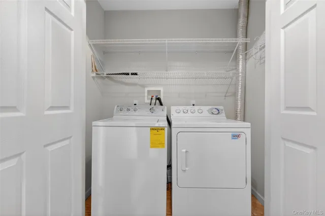 a utility room with dryer and washer