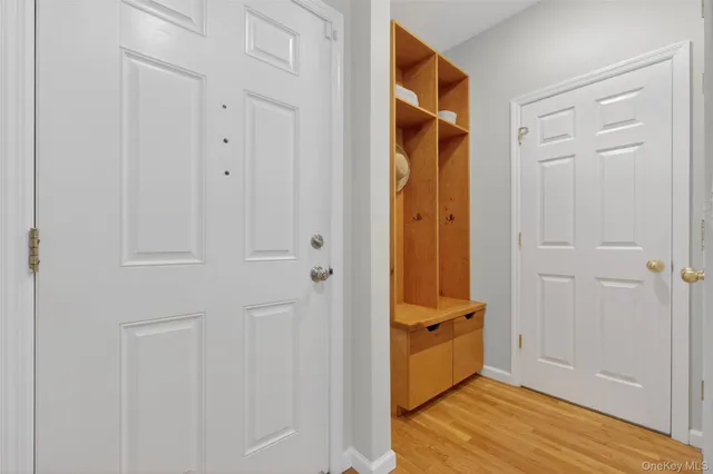 a view of bathroom with a sink and mirror